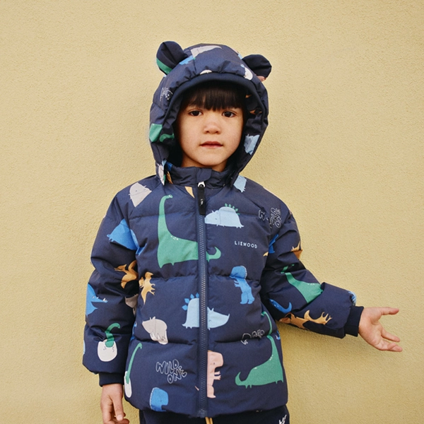 LIEWOOD Polle péřová bunda Dino roar / Classic navy LIEWOOD Polle péřová bunda Dino roar / Classic navy